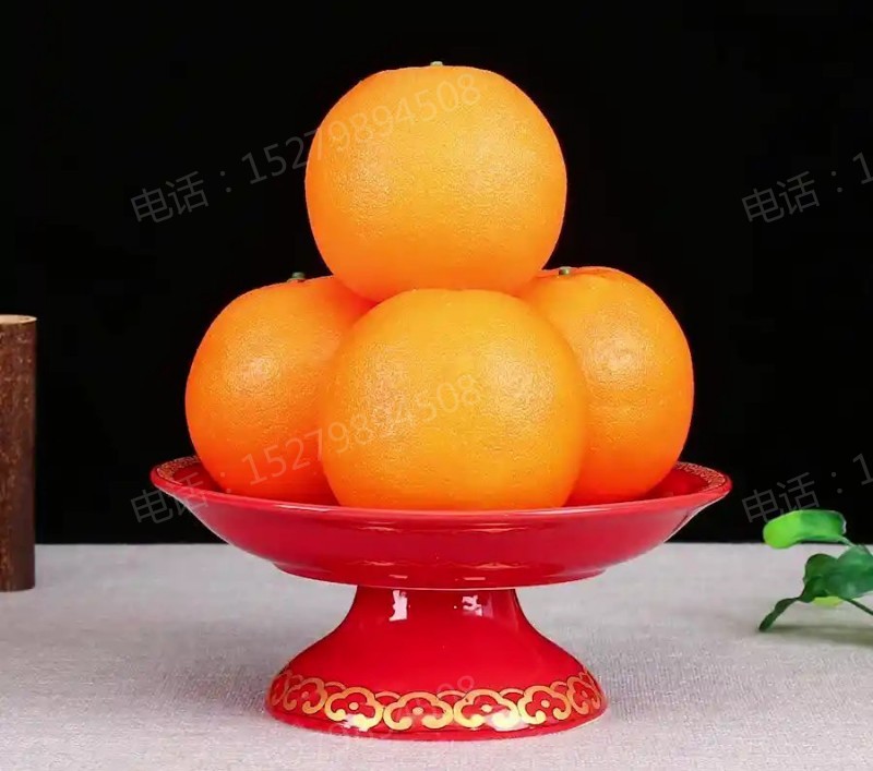 右江家庭供奉红色供果盘